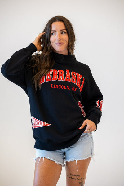 Nebraska All Over Scatter Oversized Funnel Neck